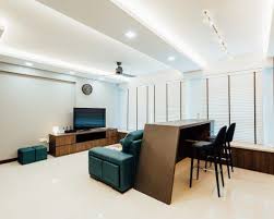 A Bar Counter Sits At The Back Of The Sofa In This Hdb Living Room False Ceiling Design Ceiling Design Home Decor