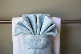 You can keep it practical and basic or try to have fun with a more decorative fold. How To Display Towels Decoratively Hunker Bathroom Towel Decor Bathroom Towels How To Fold Towels