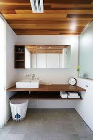 The simplicity and beauty of this bathroom present a distinctive japanese flair with its wooden open vanity that supports the two white basins of the sink. Re Max Action Realty Yukon On Twitter 33 Wondrous Japanese Bathroom Ideas Https T Co Ccp6660qqz Japanesebathroom Bathroomideas Japanesebathroomideas Remax Remaxactionrealty Whitehorse Yukon Canada Https T Co Ax3a9xeuhs