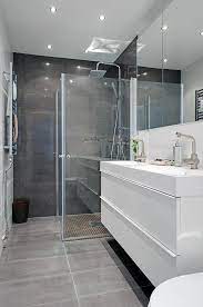 À la fois esthétique et pratique, le carrelage intérieur a de nombreux arguments à faire valoir. Une Salle De Bains Grise Elegance Et Chic Contemporain Archzine Fr Salle De Bains Chics Salle De Bain Grise Salle De Bain Design