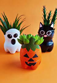 Halloween Recycled Bottle Planters Craft Hello Wonderful Halloween Diy Crafts Bottle Crafts Plastic Bottle Crafts