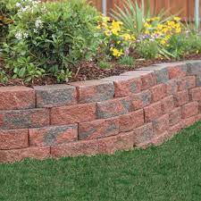 They naturally mesh with any décor of your landscape. Pavestone 4 In X 11 75 In X 6 75 In Oaks Blend Concrete Retaining Wall Block 81188 The Home Depot Sloped Garden Concrete Retaining Walls Landscaping Retaining Walls