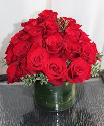 At times, you don't need a reason to pamper your wife and make her feel special. Lush And Low Two Dozen Red Roses Rose Arrangements Red Rose Arrangements Red Roses