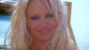 Pamela Anderson and sons strike a front-row pose at Copenhagen Fashion Week 