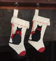 Surprise them with their very own christmas stocking. Cat Christmas Stocking Christmas Cat Stocking Black Cat Etsy Cat Christmas Stocking Christmas Stockings Cat Stocking