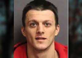 If You've Seen This Man, Rome PD Has a Warrant for His Arrest