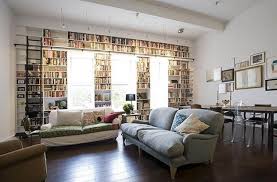 Internet wags spot pointed choices on bookshelf behind books with politically unflattering titles were displayed behind boris johnson novels included the twits, the subtle knife, betrayed and the resistance lining the bookshelf were novels including roald dahl's the twits, philip pullman's the subtle. Space Saving Room Furniture Placement Ideas Putting Bookcases And Shelves Behind Sofas And Beds