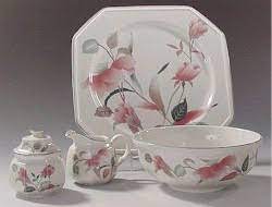 Bought new in the 90's and rarely used. Discontinued Mikasa Silk Flowers Dinnerware