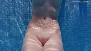 Brunette big tits babe swims nude and hot - XNXX.COM