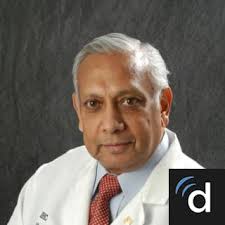 Dr. Arnold H. Menezes, MD