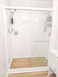 Diy Cedar Plank Floor To Give Your Bathroom A Spa Look It Took Your Basic Run Of The Mill Shower Floor And Made Shower Floor Bathroom Spa Diy Trendy Bathroom