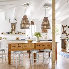 The symmetrical arrangement within the exposed beams adds even more visual interest to the ceiling. 20 Best Kitchen Lighting Ideas Kitchen Light Fixtures
