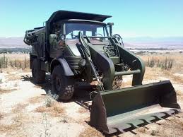 Unimog With Bucket Loader And Backhoe Kranbil
