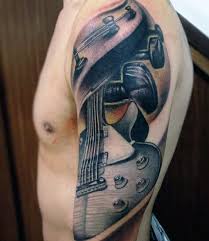 Please take a look at these cool music tattoo designs and let us know which one you like the most. 60 Music Sleeve Tattoos For Men Lyrical Ink Design Ideas