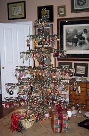 Artificial trees collect to much dust and mites which flares up my allergies, but this tree doesn't. Art In Stitches Working And Reminiscing