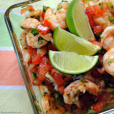 Shrimp, cucumber, tomato, cilantro, jalapeno, and red onions all get tossed to make this ceviche. Shrimp Ceviche Healthy Easy Foxes Love Lemons