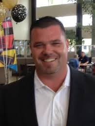 Jeromie Allan, general manager of Gary Yeomans Ford Lincoln explains the  importance of the dealership receiving a Ford 2015 President's Award.