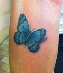 Butterfly Tattoo By Wojo James Wojo Wojtowicz Butterfly Tattoo Blue Butterfly Tattoo Moon Tattoo