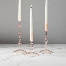 Shining meadow candle holder this shining candle holder in silver finish is characterized by iron, glass and acrylic construction. Paradiso Taper Holders Rose