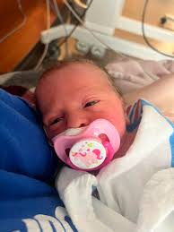 How to keep a newborn baby awake during breastfeeding?