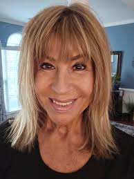 What hairstyles suit a 69-year-old woman?