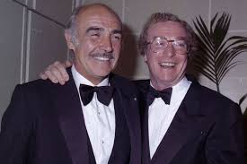 Financial wizard doc fletcher (michael caine) is sent by crime boss joe fiore (martin balsam) to two con men try to settle their rivalry by betting on who can be the first to swindle a young american. Michael Caine I Was So Poor As A Young Actor That I Couldn T Get A Round In So All My Mates Dropped Me Mirror Online