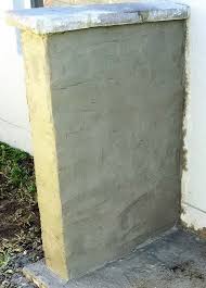 How to apply stucco over painted concrete block? Great Way To Hide Outdoor Trash And Recycle Bins