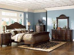 Spiral pilasters, intricate flourishes, and floral motifs adorn dark rich wood in this luxurious bedroom collection that brings elegance and grace to any home. North Shore Sleigh 4pc Bedroom Set Sale