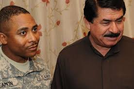 U.S. Army Sgt. 1st Class Greg Seamon (left) of Headquarters