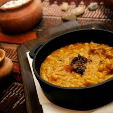Receta de locro, con los ingredientes calabaza, perejil, maíz, cerdo, laurel y comino para su preparación. Receta De Locro Original Clarin Com