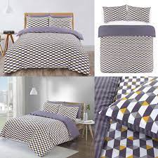 Sunny or moody mustard yellow perfectly completes a modern graphite grey bedroom with a white bed, lights and photos and lemon yellow bedding to. Grey Mustard Geometric Modern Duvet Cover Set