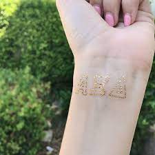 Greek Letter Metallic Tattoos A List Greek Designs