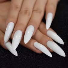 See more ideas about stiletto nail art, nail art, stiletto nails. Amazon Com Slim Extreme Long Stiletto Fake Nails White Sharp Tips Glossy With Uv Cover Acrylic Nails With Glue Tabs Beauty