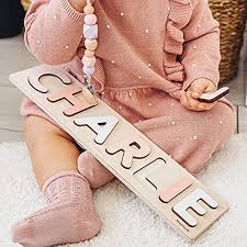 Celebrity the new mum announced the news via her podcast. Amazon Com Name Puzzle With Pegs Personalized Wooden Name Puzzle Wooden Toys Custom Name Puzzle By Busypuzzle Christmas Present Personalized Birthday Baby 1 Year Old Gifts Boy And Girl Handmade Products
