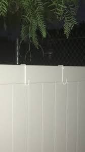 The aluminum construction provides rust resistance and makes the ties easy to work with since they can be easily bent by hand. Alumahangers Powder Coated Steel Hangers For Vinyl Fence 8 Pk Made In Usa White 2 Wide X6 Long Fits Easily Over Top Of Most Vinyl Fences Amazon Sg Garden