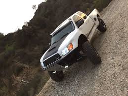 long travel tundra prerunner suspension baja widened fenders long travel suspension wheels windshield light b toyota tundra toyota tundra sr5 toyota trucks