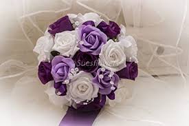 What kind of flowers go in a cascade wedding bouquet? Wedding Flowers Bridesmaid Bouquet In Purple Lilac And White Amazon Co Uk Garden Outdoors