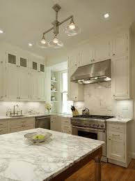 white marble backsplash traditional