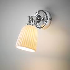 Update the lighting in your bathroom with new bathroom sconces from pottery barn. Alma Bathroom Light Chrome