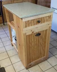 Generally, in most kitchens, islands function one of two functions. Small Kitchen Island Trash Bin Built In Small Kitchen Island Diy Kitchen Cart Kitchen Island With Trash Bin