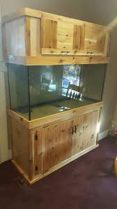 Built This Fish Tank Stand And Canopy Out Of Plywood And Cedar For My First Woodworking Project Fish Tank Stand Aquarium Stand Diy Aquarium