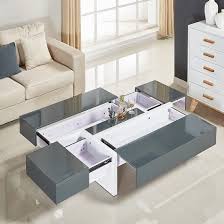 Discover our selection of the latest ranges of high gloss coffee tables choose from a variety of colours and modern styles in white, black, grey or red all with base shape options. Storm Storage Coffee Table In Grey And White High Gloss Furniture In Fashion High Gloss Furniture White Gloss Coffee Table White High Gloss Dressing Table