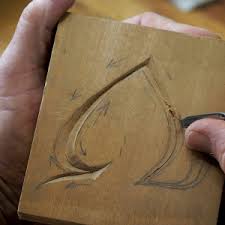 Practice leather carving on a 4 x 4 leather coffee coaster. The Art Of Letter Carving Australian Wood Review