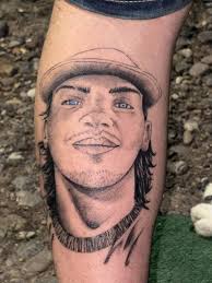 Daniel's tattoos look ridiculous.