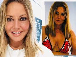 She was voted uk female rear of the year twice in 2011 and 2014. Carol Vorderman Raises Temperatures By Stripping To Bikini In Sizzling Heatwave Mirror Online
