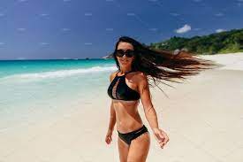 Happy Woman Relax On Beach Of Tropic Happy Women Beach Vacation Outfits Women