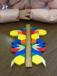 Teaching Tales Along The Yellow Brick Road Geometry Unit And Symmetry Activity Symmetry Activities Math Art Education Math