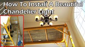To change light fixture in 2 story foyer. How To Install A Beautiful Chandelier Light In Your Home Youtube