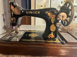Image result for singer 28k