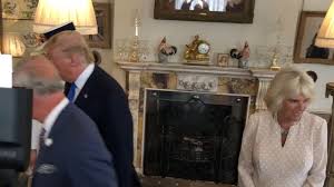 Camilla winks at cameras as Prince ...